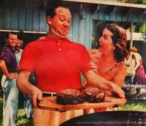 vintage suburban man at barbecue steaks