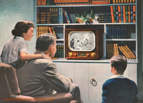 Vintage family 1948 watching TV